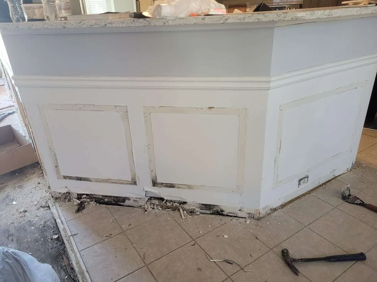 Water damage and mold on kitchen during Storm Damage Restoration in Burlington